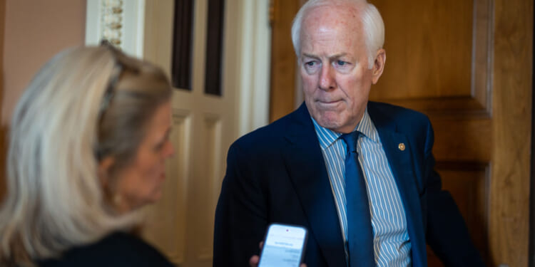 Senator John Cornyn (R-TX) speaks to reporters as the Senate votes on amendments to a reconciliation package, at the U.S. Capitol in Washington, DC on June 4, 2026.
