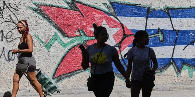 Cuba pushes through sweeping free-market reforms in biggest economic shift since the revolution