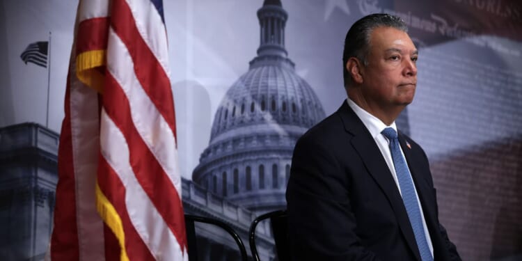 Sen. Alex Padilla listens during a news conference to introduce the Protect our Polls Act at the U.S. Capitol on June 18, 2026, in Washington, D.C.