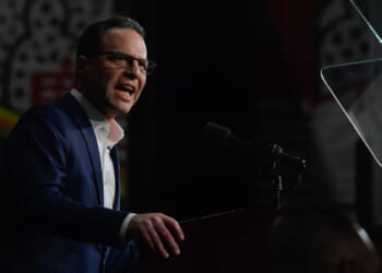 Pennsylvania Gov. Josh Shapiro speaks to supporters at a rally.