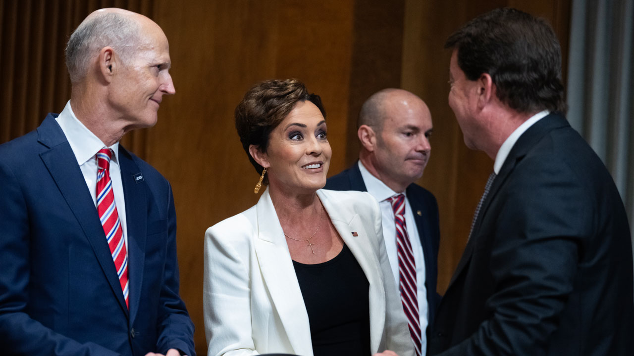 Sen. Rick Scott and Kari Lake arrive for a Senate Foreign Relations Committee hearing.