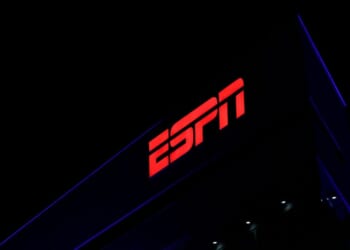 The ESPN logo is displayed at the top of a building in L.A. Live on Dec. 9, 2025, in Los Angeles, California.