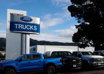 Ford pickup trucks are displayed on the sales lot at Serramonte Ford on Jan. 6, 2026, in Colma, California.
