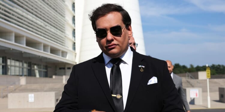 Former Rep. George Santos prepares to give a statement after a court hearing on Aug. 19, 2024, in West Islip, New York.