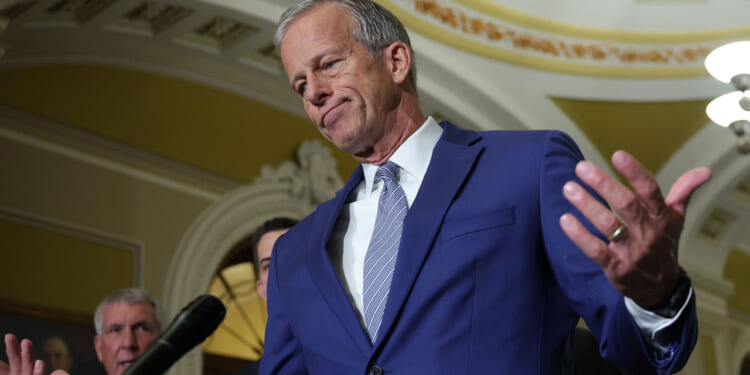 Senate Majority Leader John Thune speaks to reporters after the weekly Senate policy luncheons at the U.S. Capitol.
