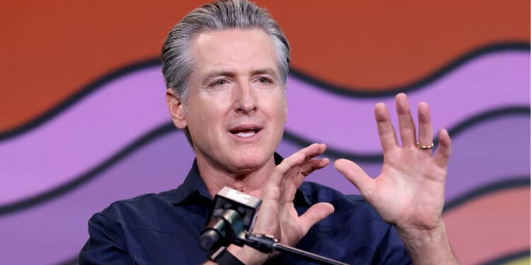 California Gov. Gavin Newsom, seen in a March photo, announced his latest ideas about seizing other people's money and ushering in an "economic reset" Friday.