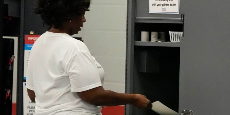 Georgia’s QR codes for counting votes will remain for midterms after lawmakers vote to delay a fix