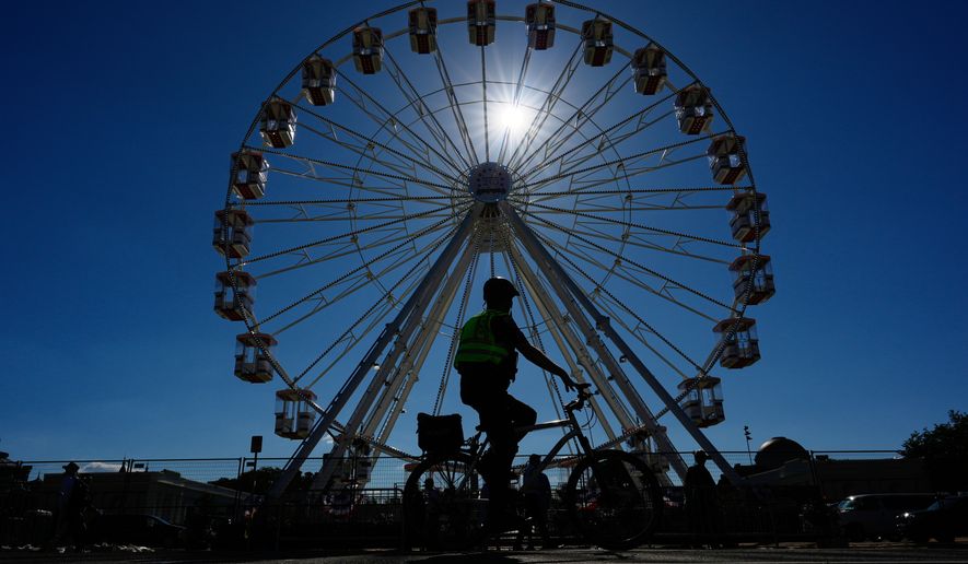 The Freedom 250 Ferris Wheel is seen before the opening of the Great American State Fair on the National Mall, Wednesday, June 24, 2026, in Washington. (AP Photo/Carolyn Kaster)