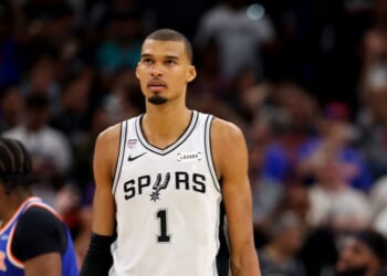 Victor Wembanyama of the San Antonio Spurs reacts during the fourth quarter against the New York Knicks in Game Five of the 2026 NBA Finals at Frost Bank Center on June 13, 2026, in San Antonio, Texas.