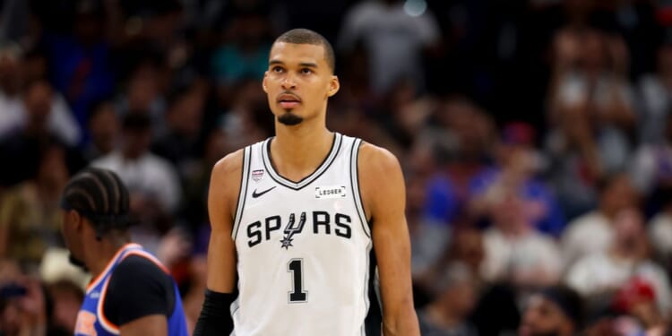 Victor Wembanyama of the San Antonio Spurs reacts during the fourth quarter against the New York Knicks in Game Five of the 2026 NBA Finals at Frost Bank Center on June 13, 2026, in San Antonio, Texas.
