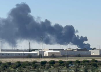 Smoke rises from an area of Kuwait's international airport after a reported drone strike on April 1, 2026.