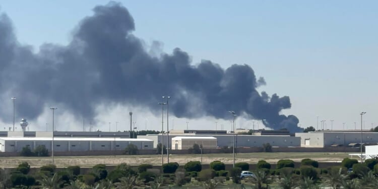 Smoke rises from an area of Kuwait's international airport after a reported drone strike on April 1, 2026.