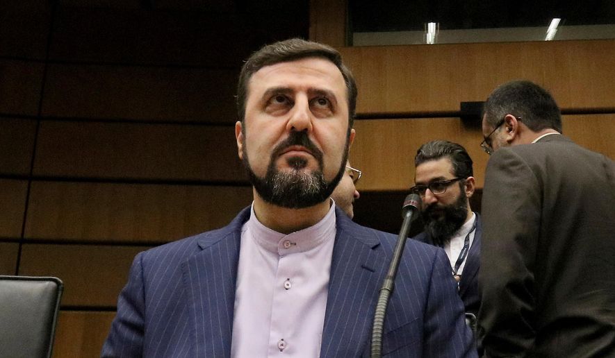 Iran's then-Ambassador to the International Atomic Energy Agency, IAEA, Kazem Gharibabadi, waits for the start of the IAEA board of governors meeting at the International Center in Vienna, Austria, Nov. 21, 2019. (AP Photo/Ronald Zak, File)