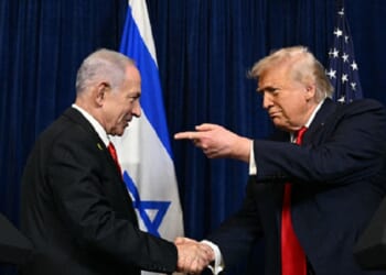 Israeli Prime Minister Benjamin Netanyahu and President Donald Trump shake hands during a December meeting at the Mar-a-Lago Club in South Florida.