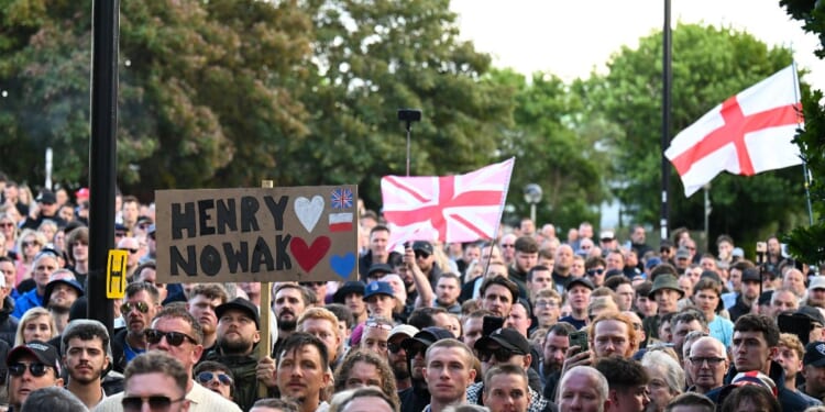 People attend a protest about the police's handling of the arrest of Henry Nowak at Southampton Central Police Station on June 2, 2026, in Southampton, England.
