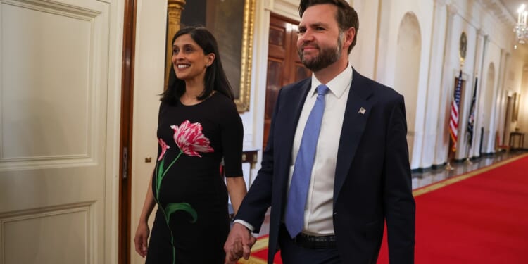 Second lady Usha Vance and U.S. Vice President JD Vance holding hands