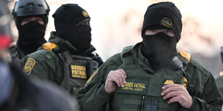 Justice Department sues Philadelphia over anti-ICE mask law