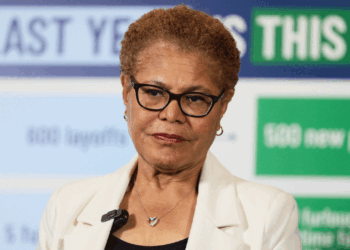 Karen Bass looks ahead with a straight face.