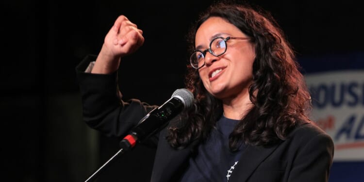 Congressional candidate Claire Valdez speaks during her primary-night watch party Tuesday in New York City. Valdez, a member and leader in the Democratic Socialists of America, was one of three progressive or socialist candidates endorsed by Mayor Zohran Mamdani.