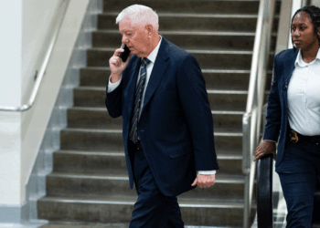 Sen. Lindsey Graham, R-S.C., walks through the Senate subway area in the U.S. Capitol with a security detail on Tuesday, June 2, 2026. (Bill Clark/CQ-Roll Call, Inc via Getty Images)