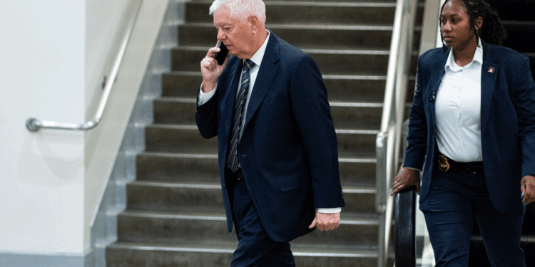Sen. Lindsey Graham, R-S.C., walks through the Senate subway area in the U.S. Capitol with a security detail on Tuesday, June 2, 2026. (Bill Clark/CQ-Roll Call, Inc via Getty Images)