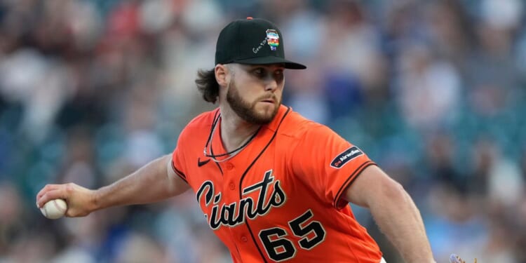 Landen Roupp of the San Francisco Giants pitches against the Chicago Cubs in the top of the first inning of a major league baseball game at Oracle Park on June 12, 2026, in San Francisco, California.