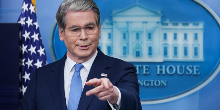 U.S. Treasury Secretary Scott Bessent speaking and pointing