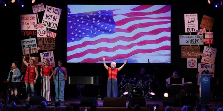 Bette Midler performs onstage during "Rise Up, Sing Out: A Concert for the First Amendment" Sunday in New York City.