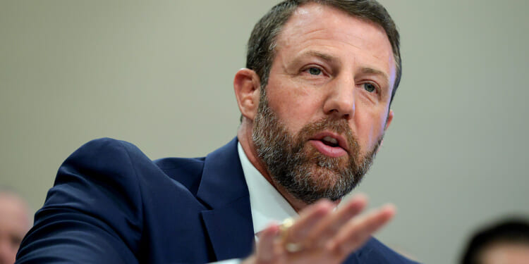 Mullin Isn't Backing Asylum for Haitians, Border Hawks Say