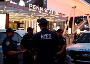 NYPD police officers are seen outside Penn Station in New York on June 7, 2026. Five people were wounded Sunday in a stabbing at New York's Penn Station, according to the city fire department, which said all victims were transported to hospital and the attacker was "in custody." The victims were all civilians, including one person with serious injuries, the New York Fire Department said in a statement. (Photo by John Lamparski / AFP via Getty Images)