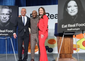 Secretary of Health and Human Services Robert F. Kennedy Jr., left, and Agriculture Secretary Brooke Rollins, right, were joined by former boxing heavyweight champion Mike Tyson, center, in February to roll out implementation of an "Eat Real Food" campaign.