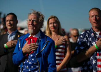 WILMINGTON, NC - SEPTEMBER 23: People says the pledge of allegiance before a Save America rally for former President Donald Trump at the Aero Center Wilmington on September 23, 2022 in Wilmington, North Carolina. The "Save America" rally was a continuation of Donald Trump's effort to advance the Republican agenda by energizing voters and highlighting candidates and causes. (Photo by Allison Joyce/Getty Images)
