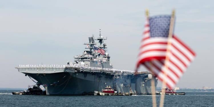 Wasp-class amphibious assault ship USS Iwo Jima returns to Naval Station Norfolk on June 6, 2026, in Norfolk, Virginia.