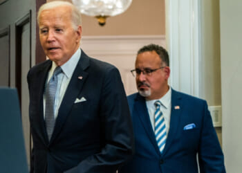 President Joe Biden and United States Secretary of Education Miguel Cardona enters for remarks on the Supreme Court's decision on the Administration's student debt relief program in the Roosevelt Room of the White House on Friday, June 30, 2023. (Photo by Demetrius Freeman/The Washington Post via Getty Images)