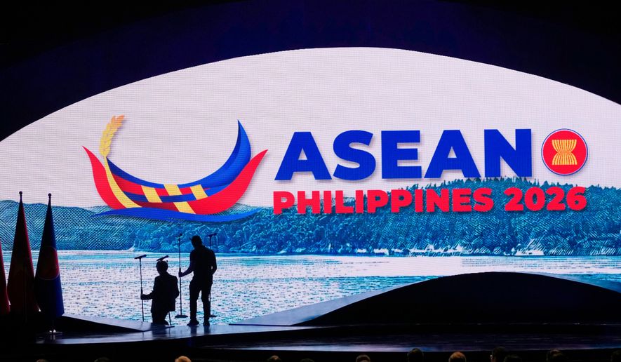 Workers arrange microphones on the stage before the start of the opening ceremony of the 48th ASEAN summit and related meetings in Cebu, Philippines, May 8, 2026. (AP Photo/Aaron Favila, Pool, File)
