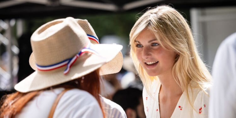 Influencer Thais d'Escufon is seen during "Reconquete" French far-right party's summer gathering, "l'Universite d'ete de Reconquete" in Orange, Southeastern France, on Sept. 7, 2024.