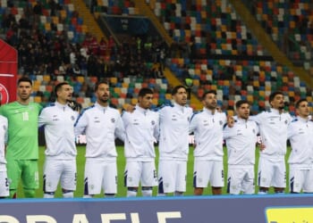 Players from Israel sing the national anthem prior to the FIFA World Cup 2026 qualifier match between Italy and Israel at Stadio Friuli on Oct. 14, 2025, in Udine, Italy.