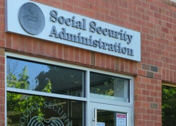 A general view of the Social Security Administration sign on a building's wall.