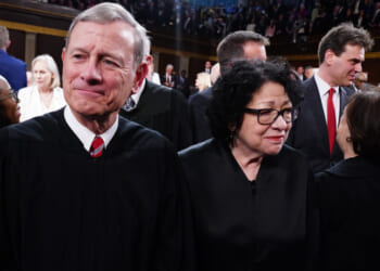 Supreme Court Chief Justice John Roberts and Associate Justice Sonia Sotomayor stand on the House floor ahead of the annual State of the Union address by U.S. President Joe Biden before a joint session of Congress at the Capital building on March 7, 2024 in Washington, DC. This is Biden's final address before the November general election. (Photo by Shawn Thew-Pool/Getty Images)