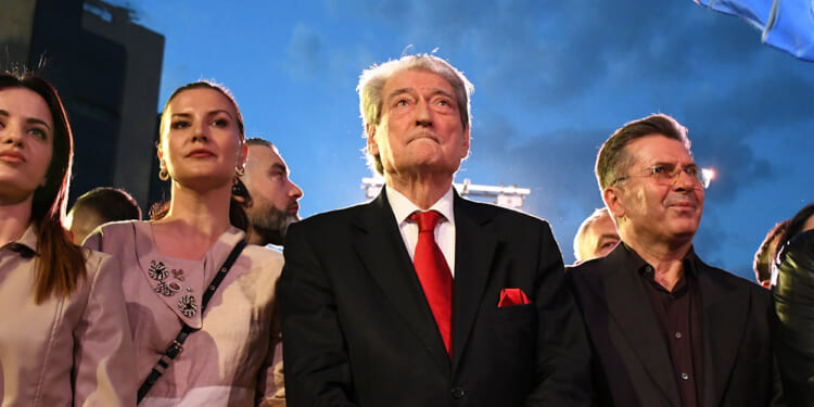 The U.S. State Department dropped sanctions against Sali Berisha, the opposition leader in Albania who is a longtime opponent of George Soros.