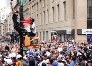 Fans line the street during the New York Knicks Championship ticker tape parade and victory rally celebrating winning the 2026 NBA Finals on June 18, 2026, in New York City.