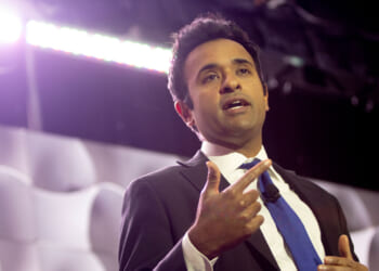 Republican nominee for Ohio governor Vivek Ramaswamy gestures from the stage for an event.