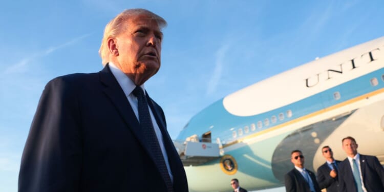 President Donald Trump walks to speak to reporters as he arrives at Orly Airport to attend a dinner with French President Emmanuel Macron at Chateau de Versailles on June 17, 2026, in Orly, France.