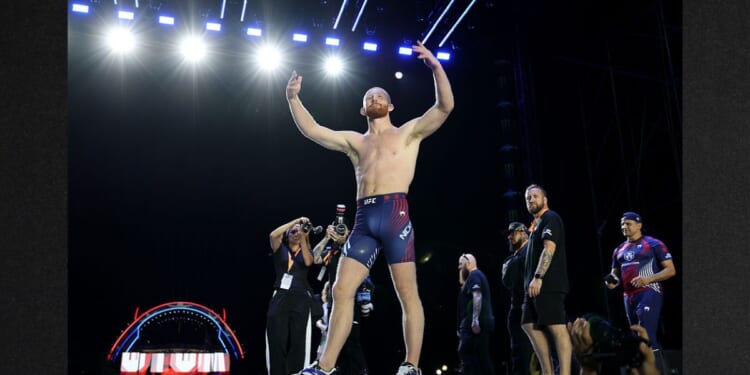 Bo Nickal greets fans Sunday after defeating Kyle Daukaus in a middleweight bout during UFC Freedom 250 on the South Lawn of the White House.