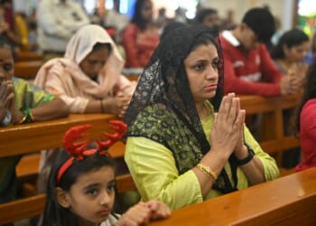Christians pray at a church in Bengaluru, India on Dec. 25, 2025.