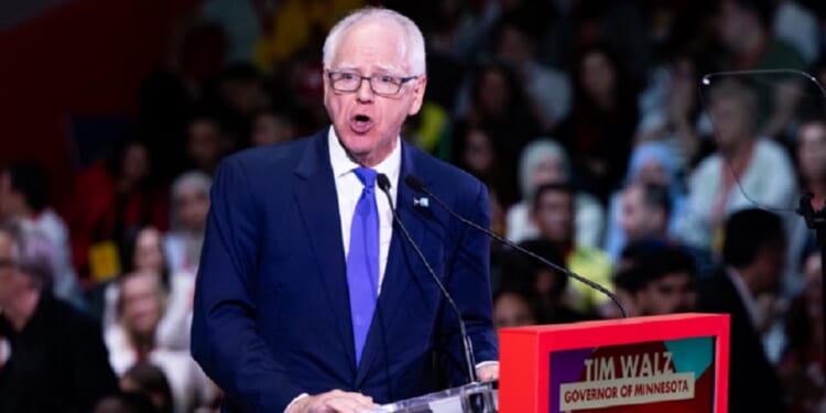 Minnesota Gov. Tim Walz, pictured speaking at a progressive political convention in Barcelona, Spain, in April.