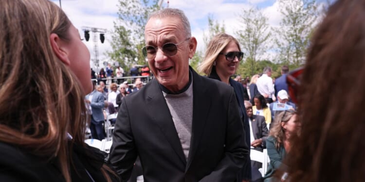 Tom Hanks attends the ceremony for the opening of the Barack Obama Presidential Center in John Lewis Plaza on June 18, 2026 in Chicago.