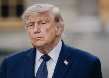 President Donald Trump poses and raises a fist after arriving to a dinner with the President of the French Republic at the Chateau de Versailles in Versailles France on June 17, 2026.