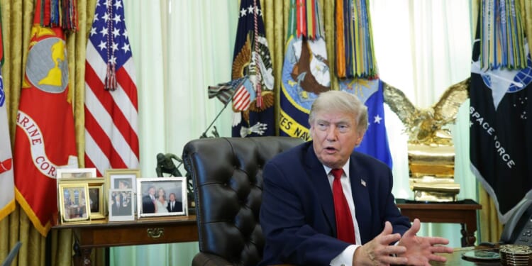 President Donald Trump talks to reporters after signing an executive order dealing with automobile repairs with Environmental Protection Agency Administrator Lee Zeldin in the Oval Office at the White House on June 29, 2026, in Washington, D.C.