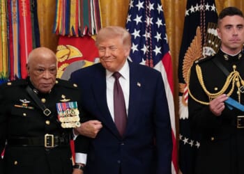 Retired Marine Maj. James Capers Jr. stands with President Donald Trump before he is presented the Medal of Honor Thursday at the White House in Washington, D.C.